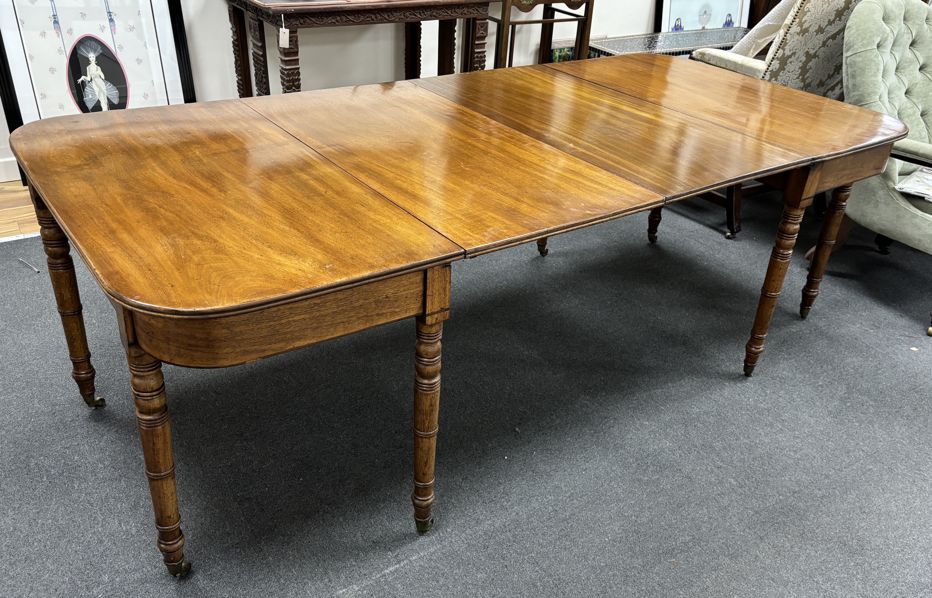 A Regency mahogany D end extending dining table, 220cm extended, depth 105cm, height 72cm